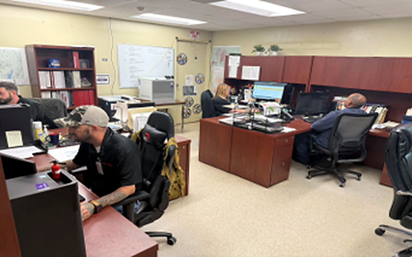 Operations team coordinating work from an administrative office