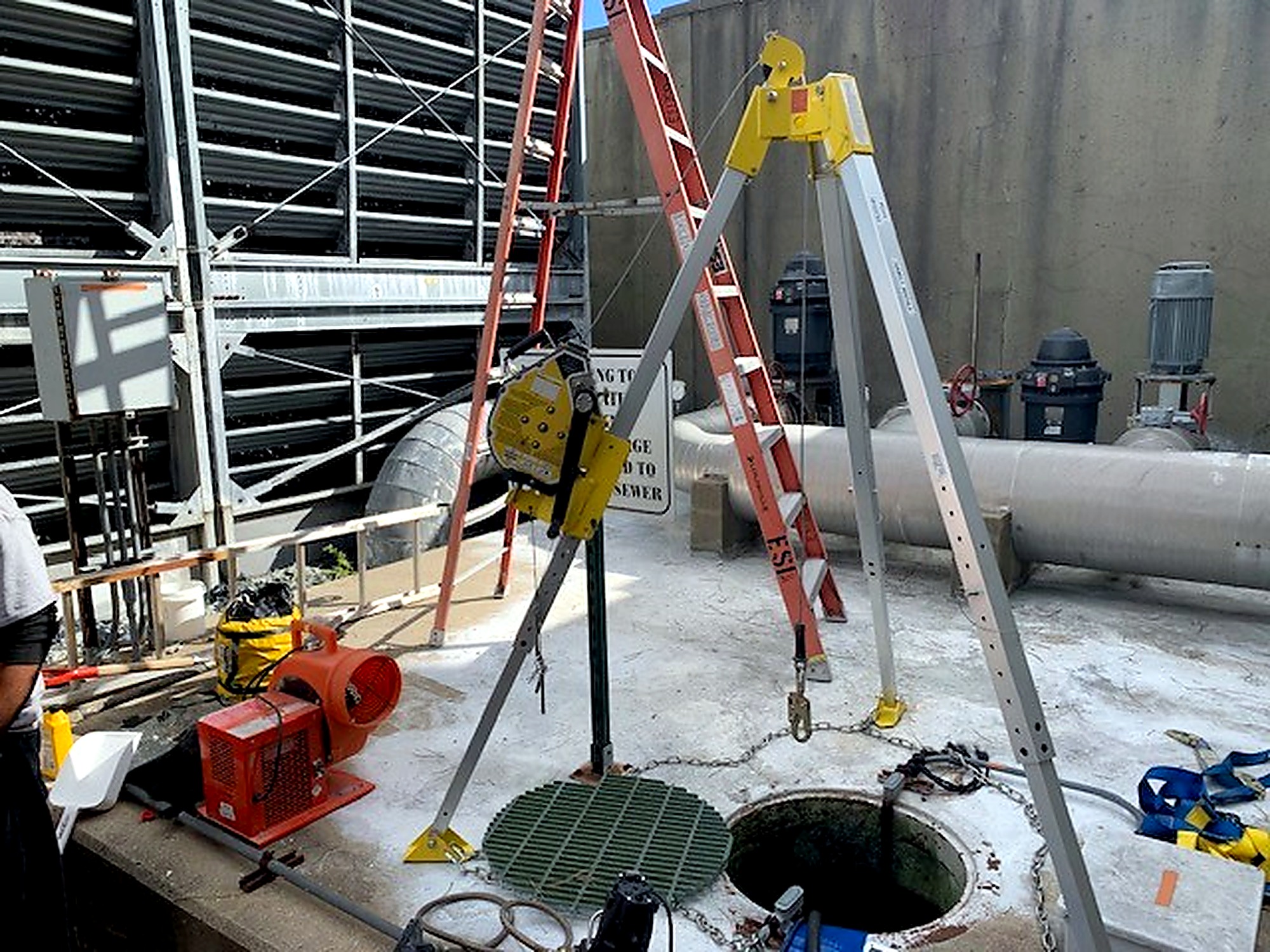 Safety and ventilation equipment staged for confined-space maintenance at Wright-Patterson Air Force Base