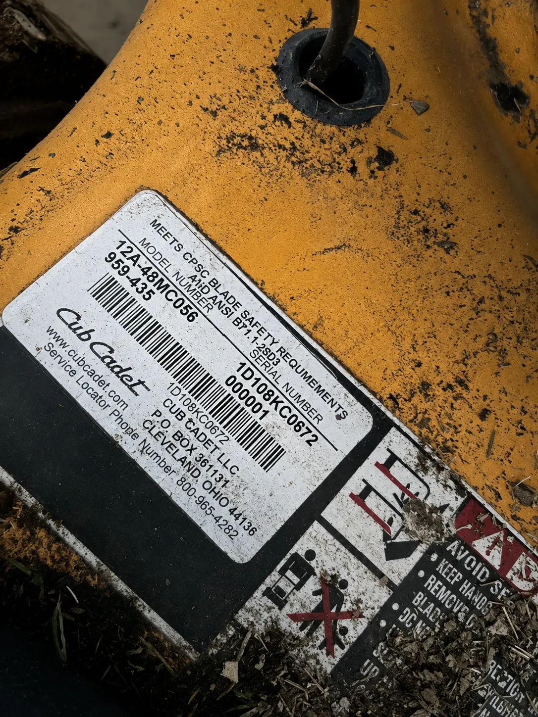 Close-up of equipment safety and maintenance labeling